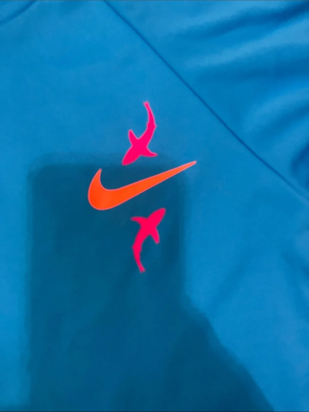 Nike Swim Blue Dri-FIT Tee with Orange & Pink Swoosh